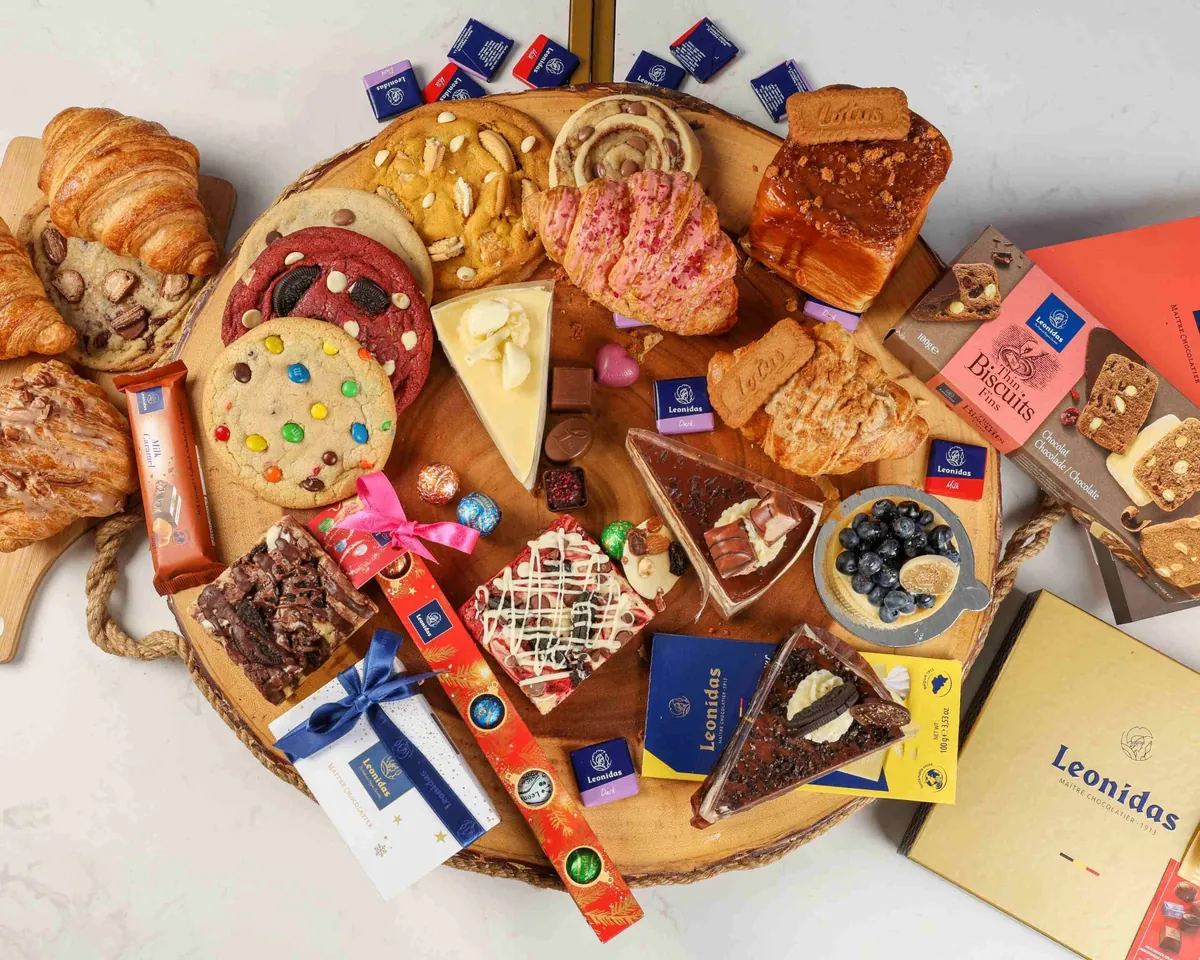 The Leonidas dessert board — pastries, cookies, cheesecake & pralines